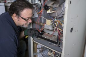 HVAC contractor notices the split system air conditioner smells musty