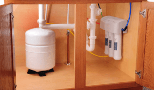Reverse osmosis system in underneath sink cabinet